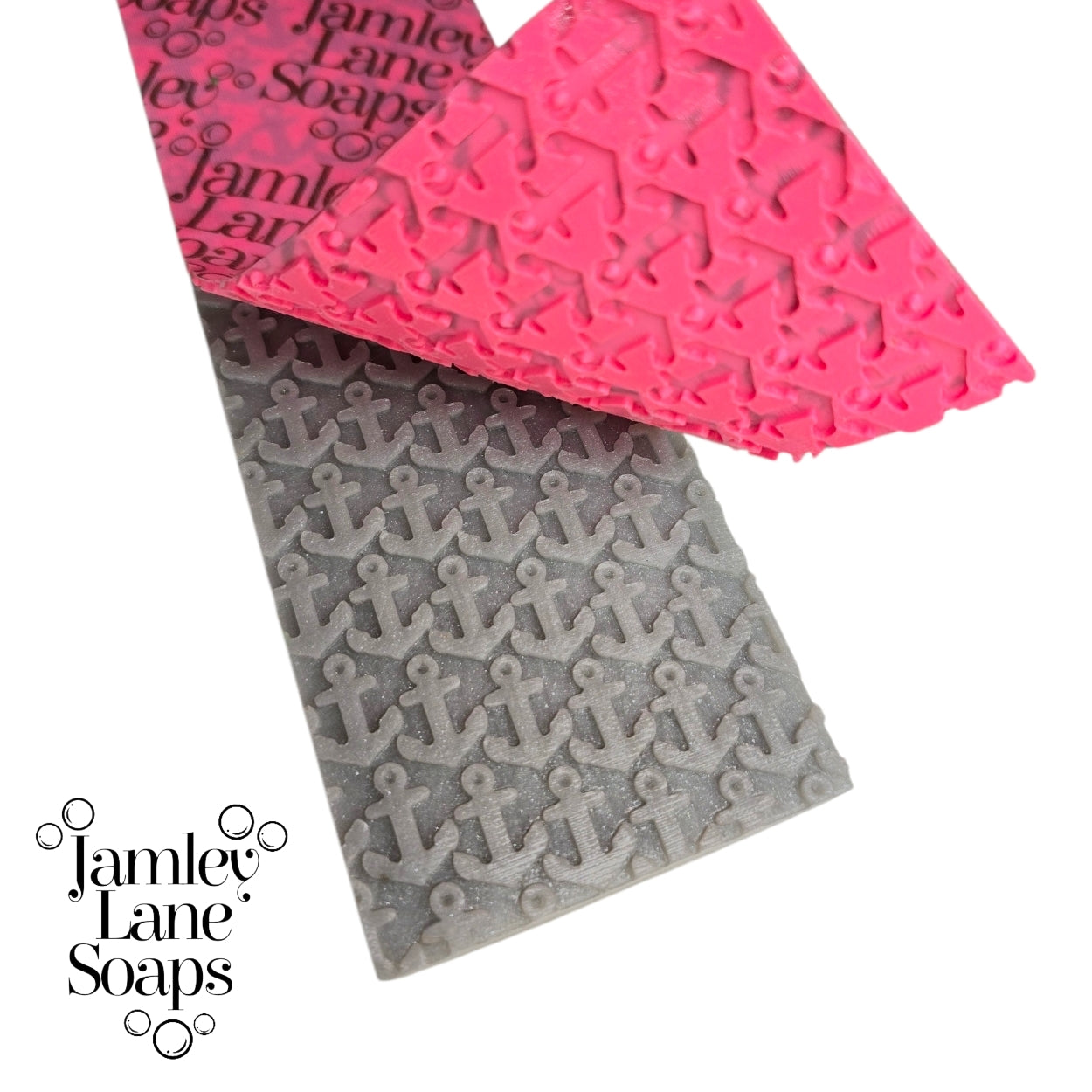 repeating anchor artisan polymer impression mat on silver melt and pour soap top