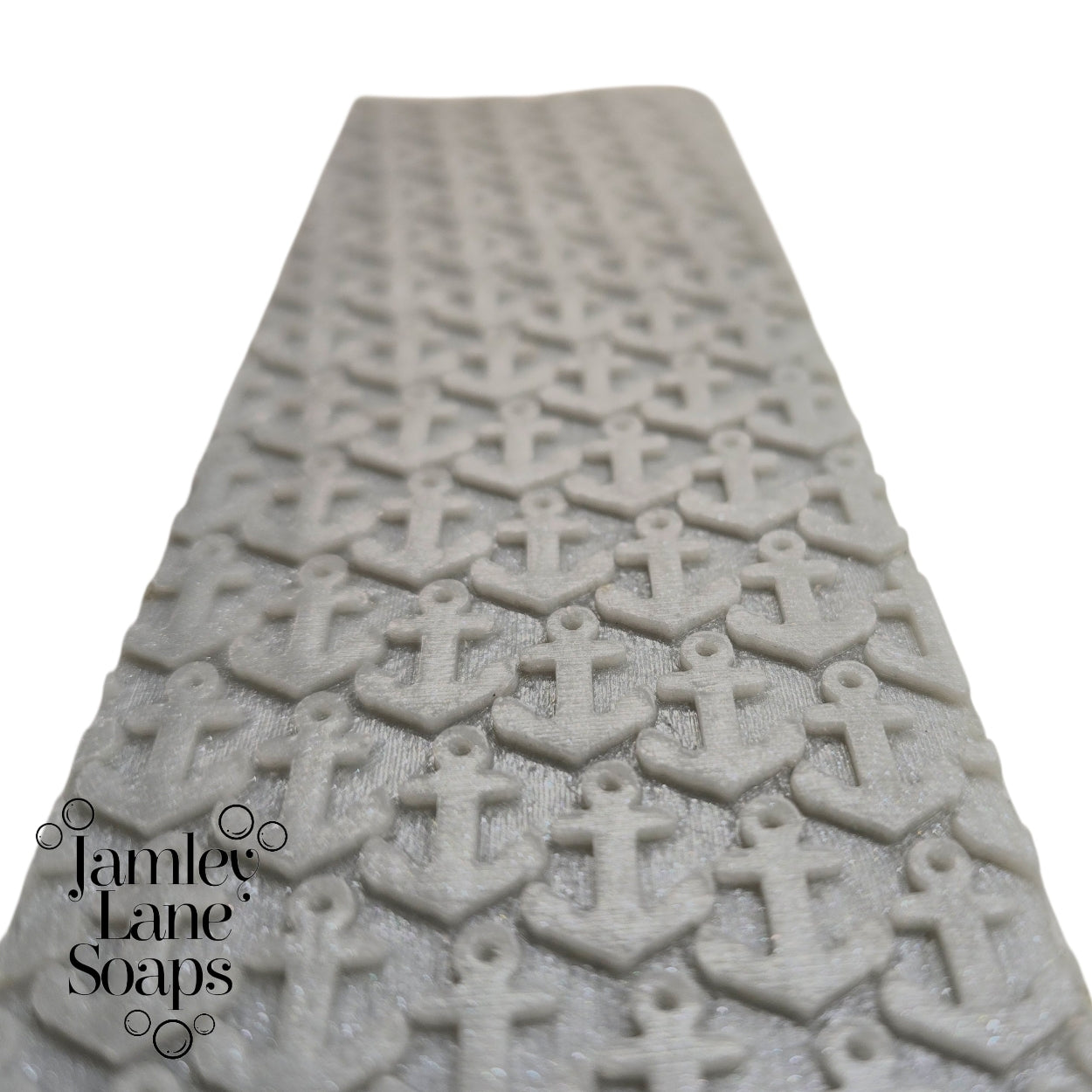 Textured soap with anchor pattern on a white background, featuring Jamley Lane Soaps branding.