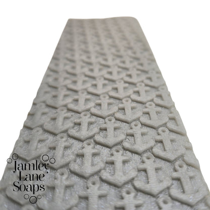 Textured soap with anchor pattern on a white background, featuring Jamley Lane Soaps branding.