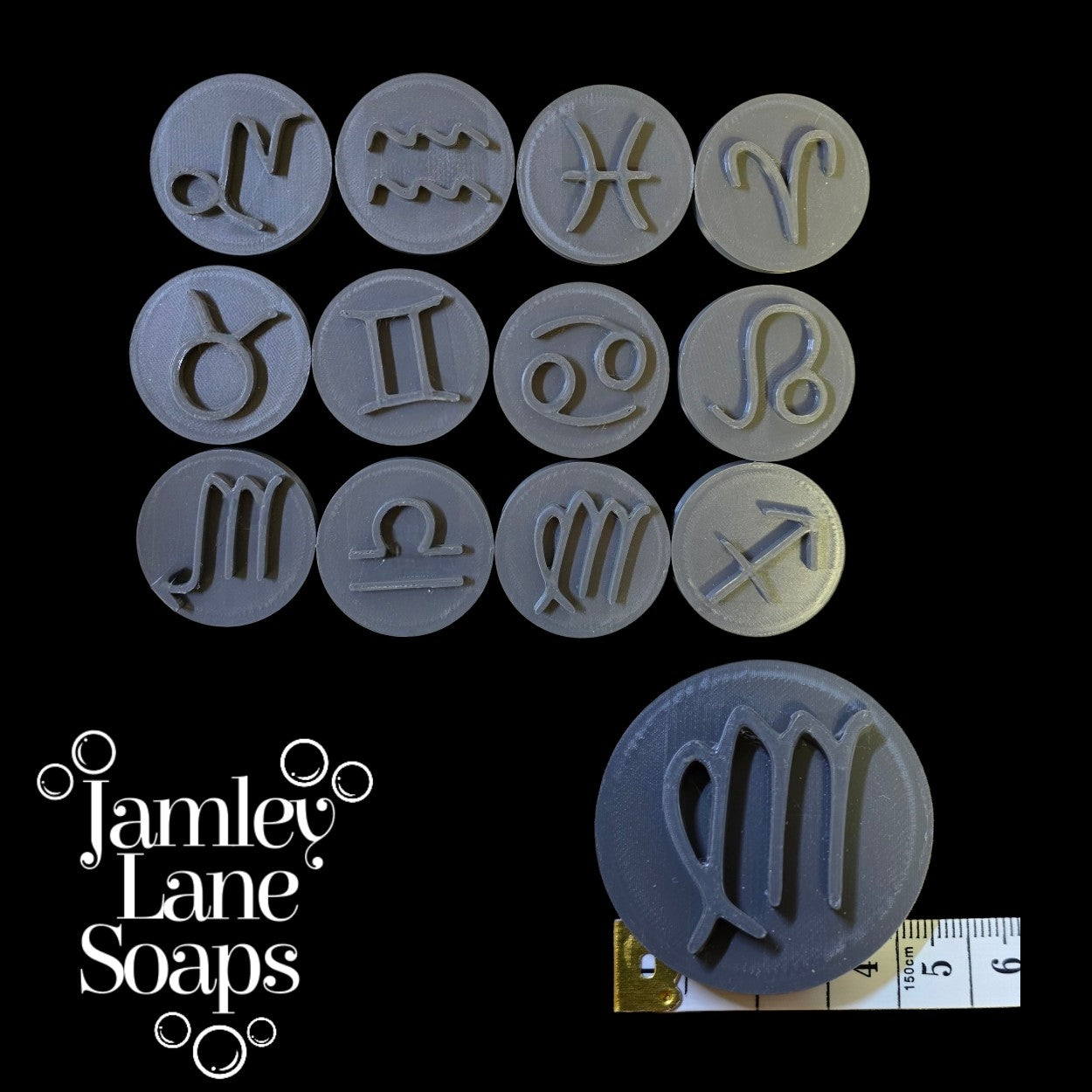 Set of zodiac symbol stampers with 'Jamley Lane Soaps' branding on a black background.