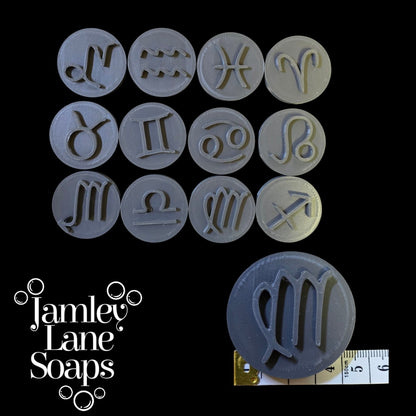 Set of zodiac symbol stampers with 'Jamley Lane Soaps' branding on a black background.