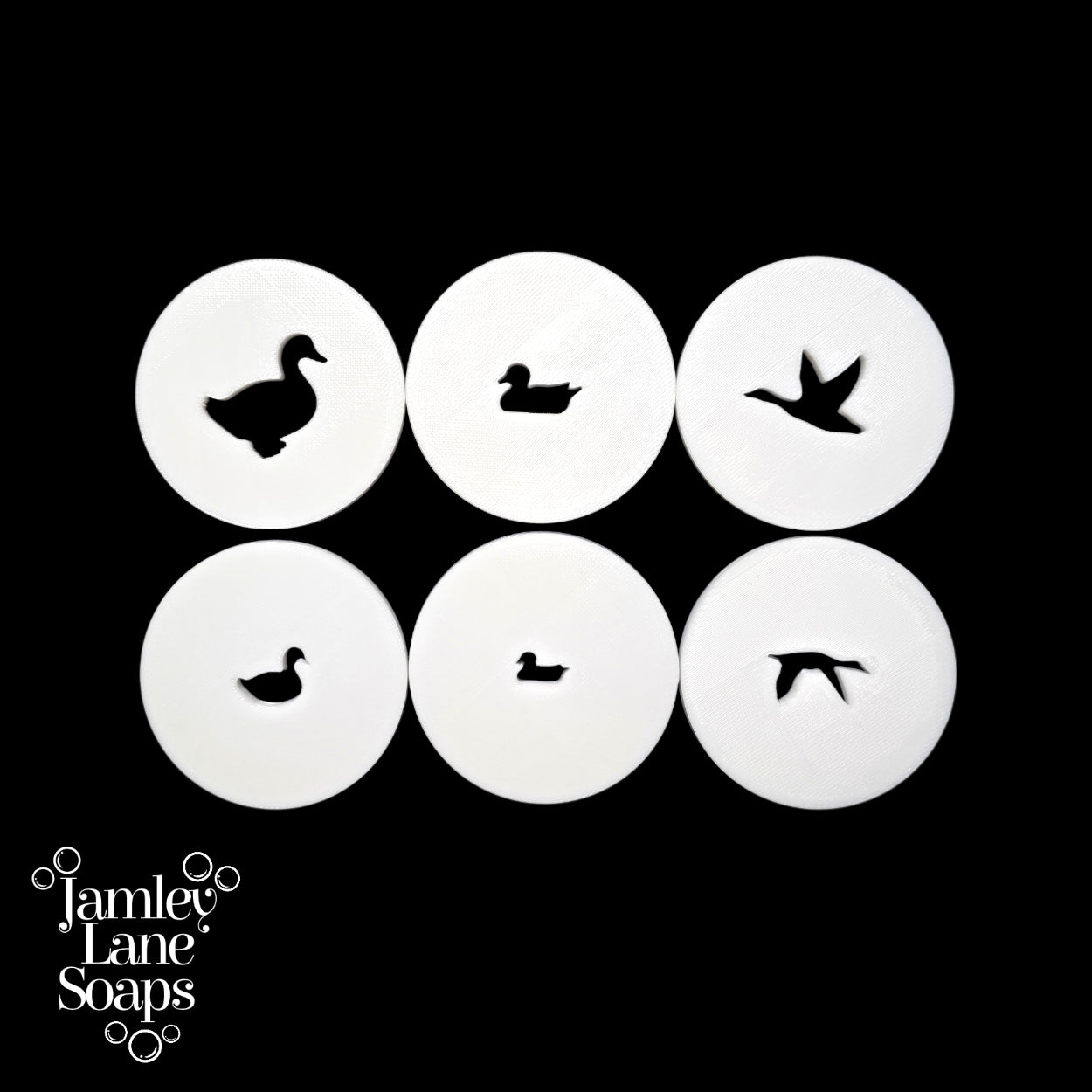 Set of six duck-shaped holes in white circle discs with 'Jamley Lane Soaps' logo below.