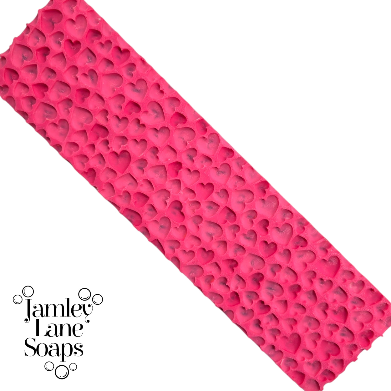 Pink artisan polymer soap mat with heart patterns on a white background, branded with 'Jamley Lane Soaps'.